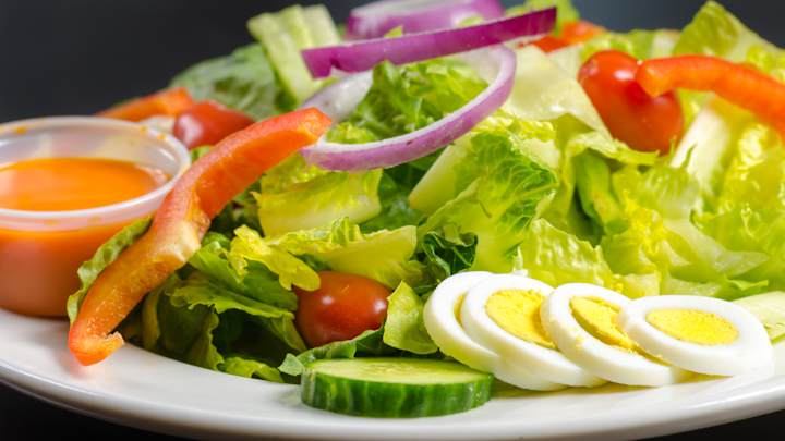 Salad with a side of devilled eggs.  